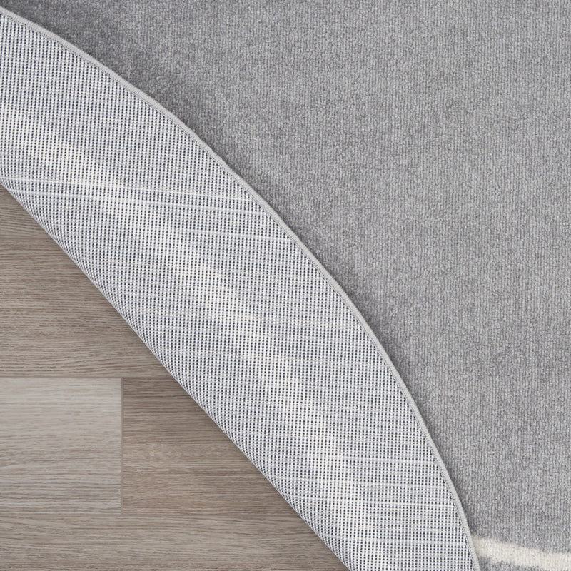 Gray rug with ivory side border detail and flat, tightly woven underside