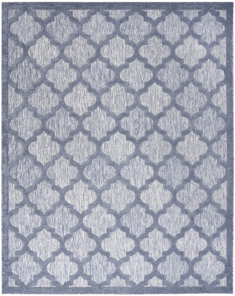 Blue indoor outdoor area rug with repeating clover-like trellis pattern, flat weave