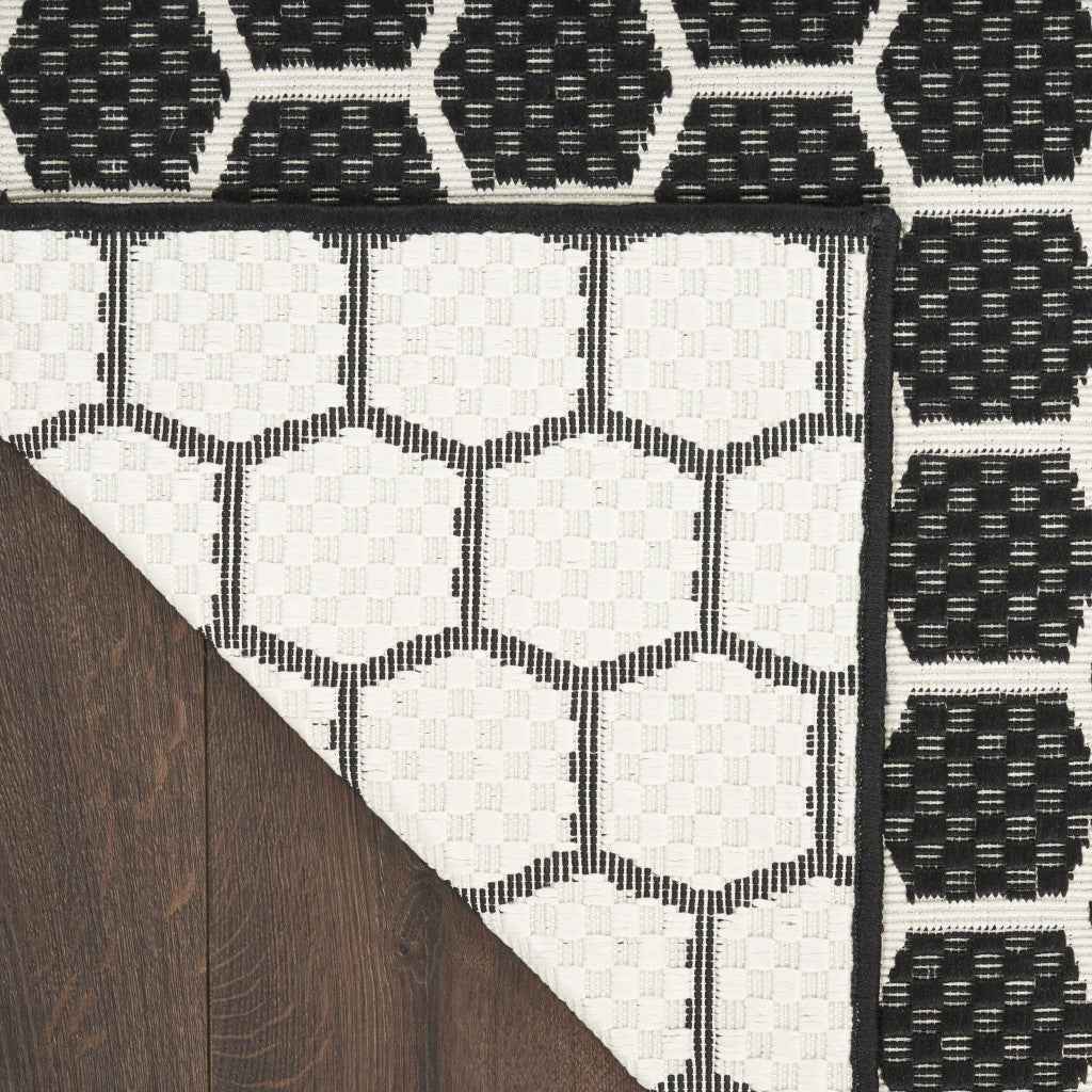 9' X 12' Black And Ivory Geometric Indoor Outdoor Area Rug