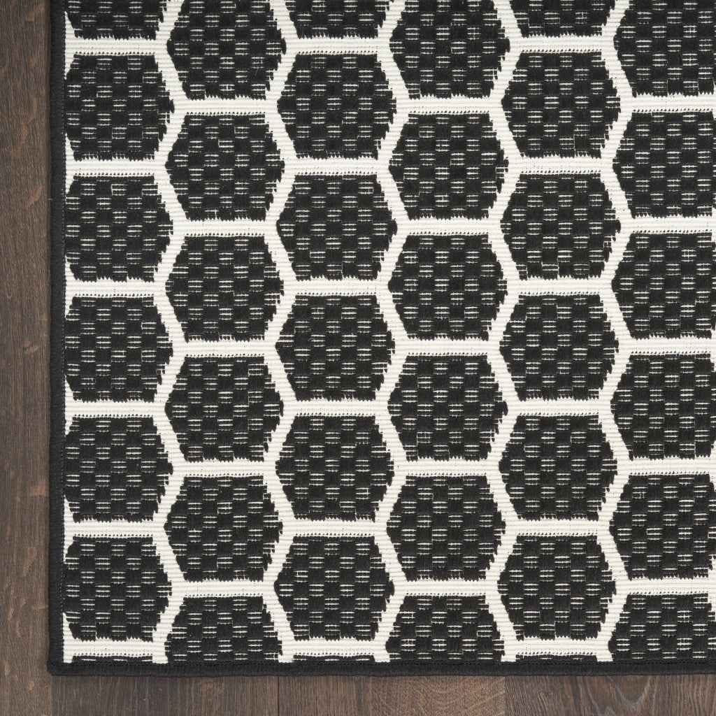 9' X 12' Black And Ivory Geometric Indoor Outdoor Area Rug