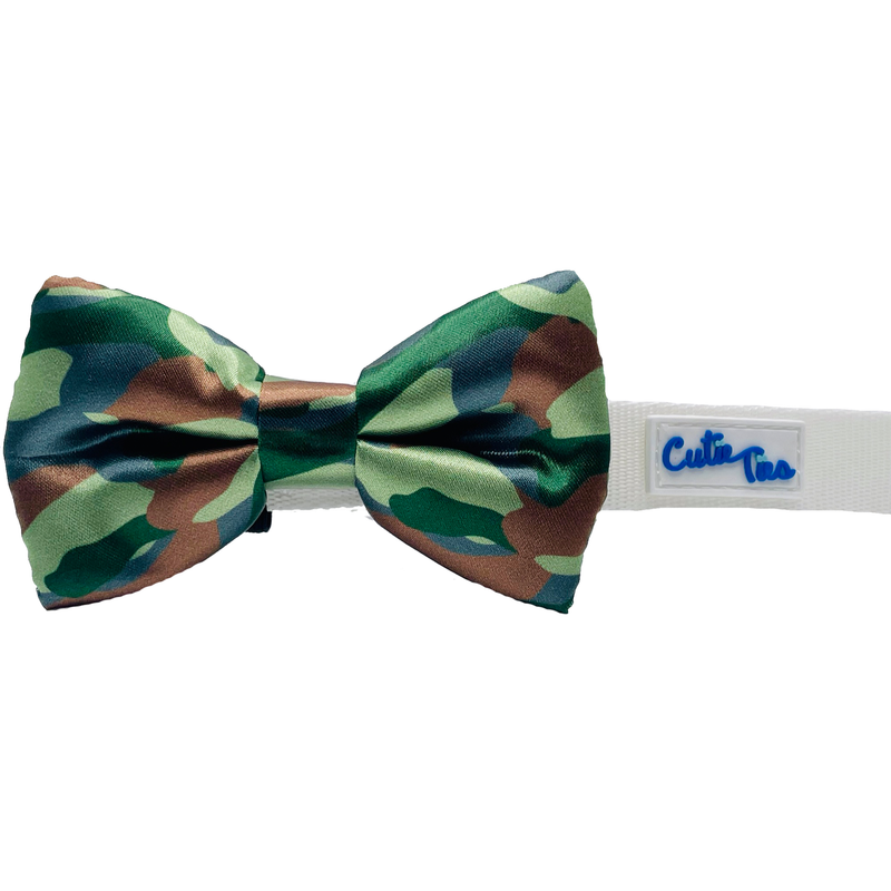 Dog bow tie with green, tan, and brown camouflage fabric bow