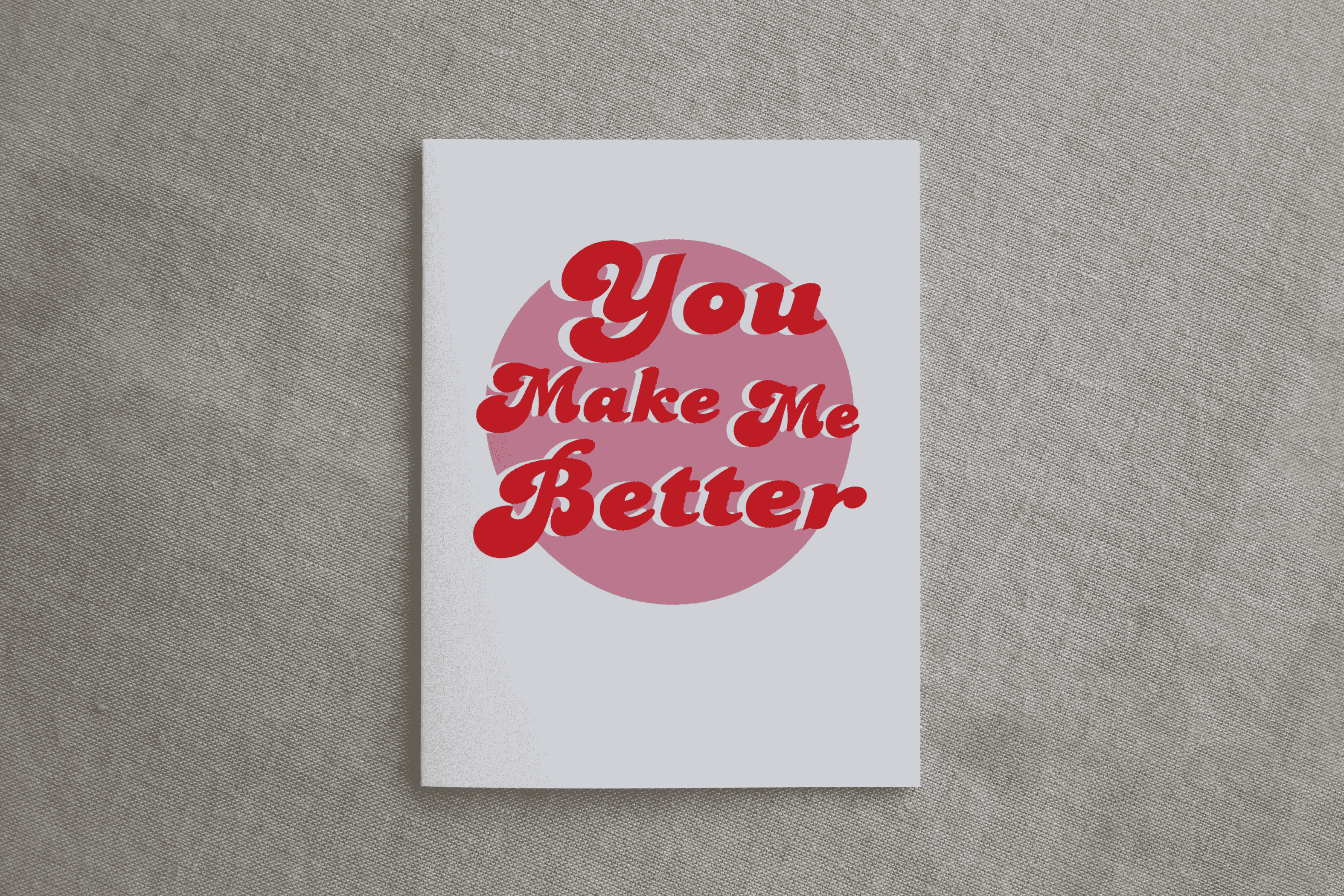 White greeting card with red "You Make Me Better" logo text
