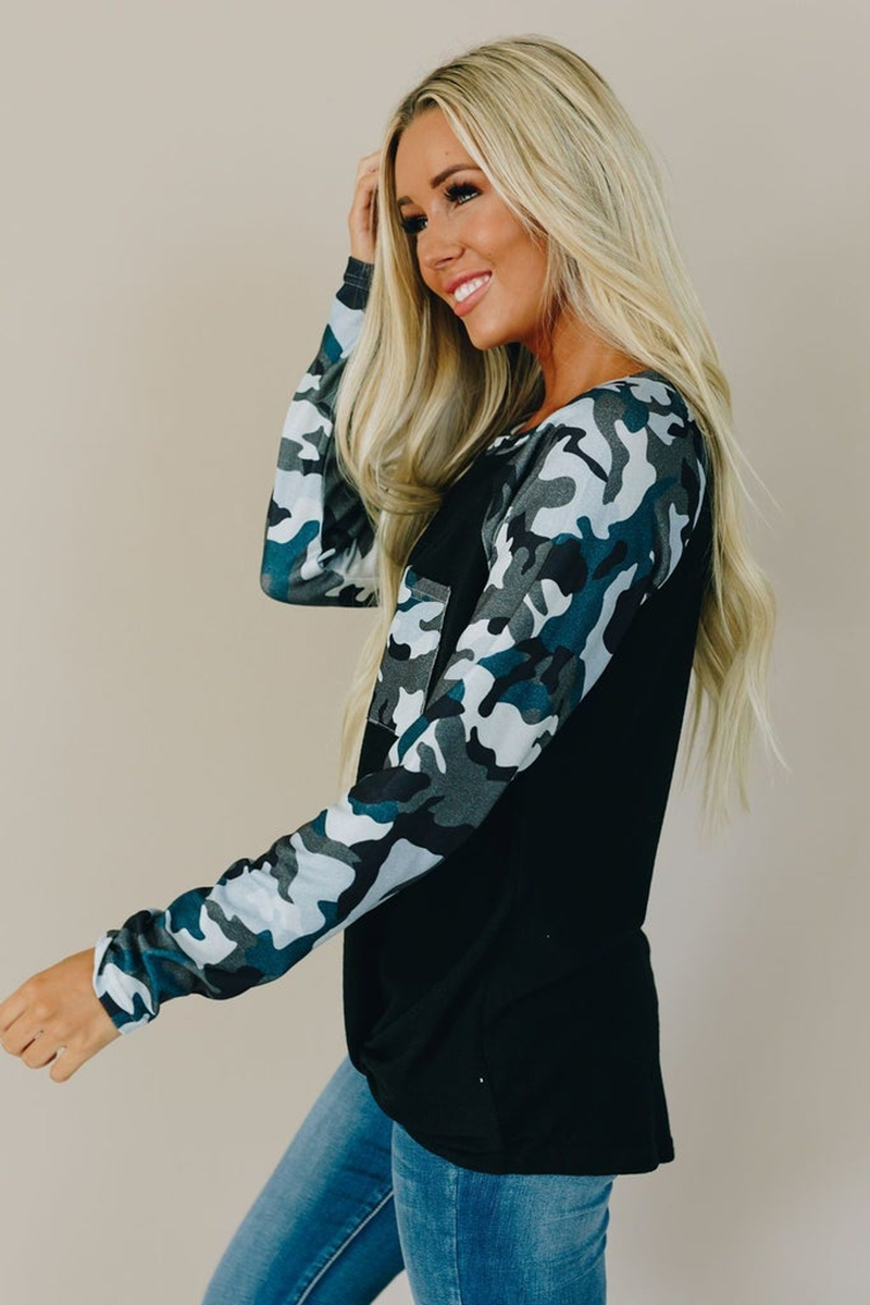 Women's black camo long-sleeve top with blue-gray camo sleeves, side view