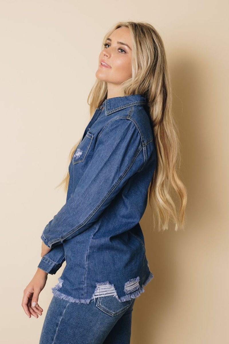 Light blue denim button-up top, side view, chest patch pocket, frayed hem