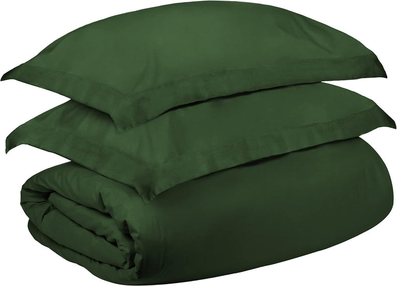 Solid dark green duvet cover set, stacked and folded with smooth fabric