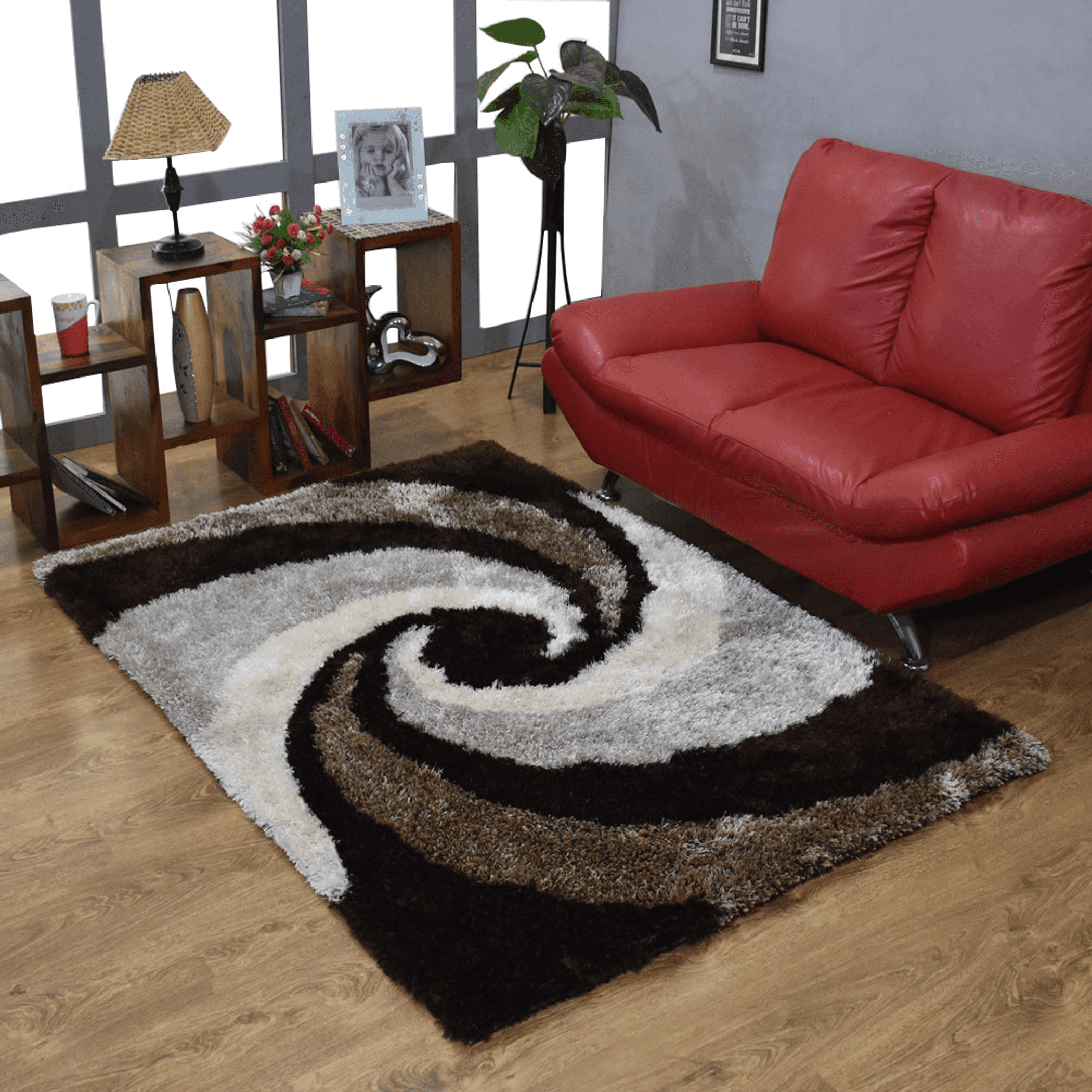 Shag spiral area rug in white, gray, and black on dark background