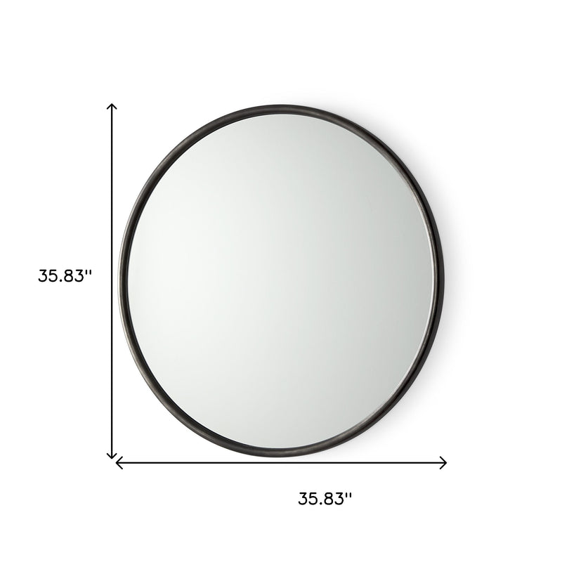 Round accent mirror with black metal frame, 35.83 in size shown