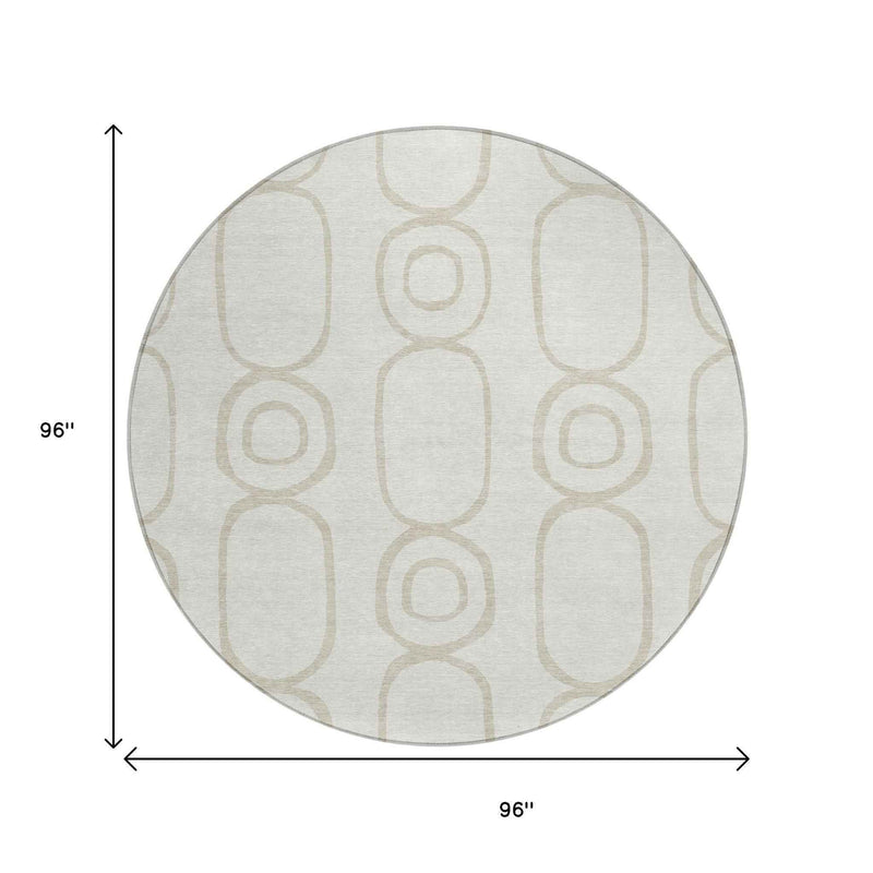 8' Ivory And Beige Round Geometric Washable Indoor Outdoor Area Rug