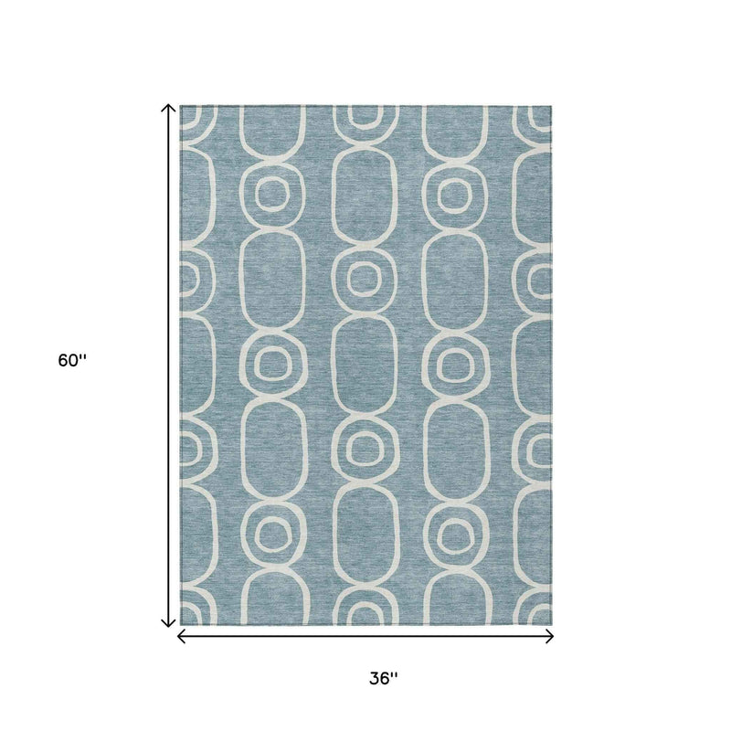 3' X 5' Aqua And Ivory Geometric Washable Indoor Outdoor Area Rug
