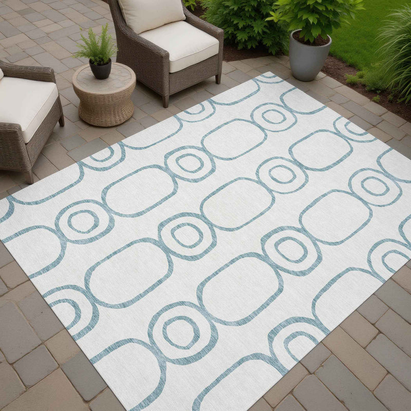 5' X 8' Teal Blue And Ivory Geometric Washable Indoor Outdoor Area Rug