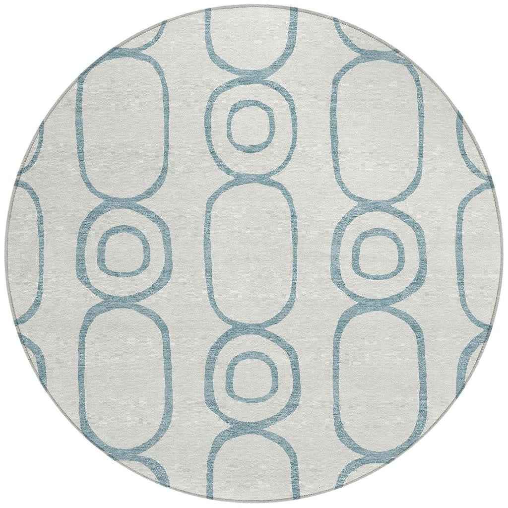 8' Teal Blue And Ivory Round Geometric Washable Indoor Outdoor Area Rug
