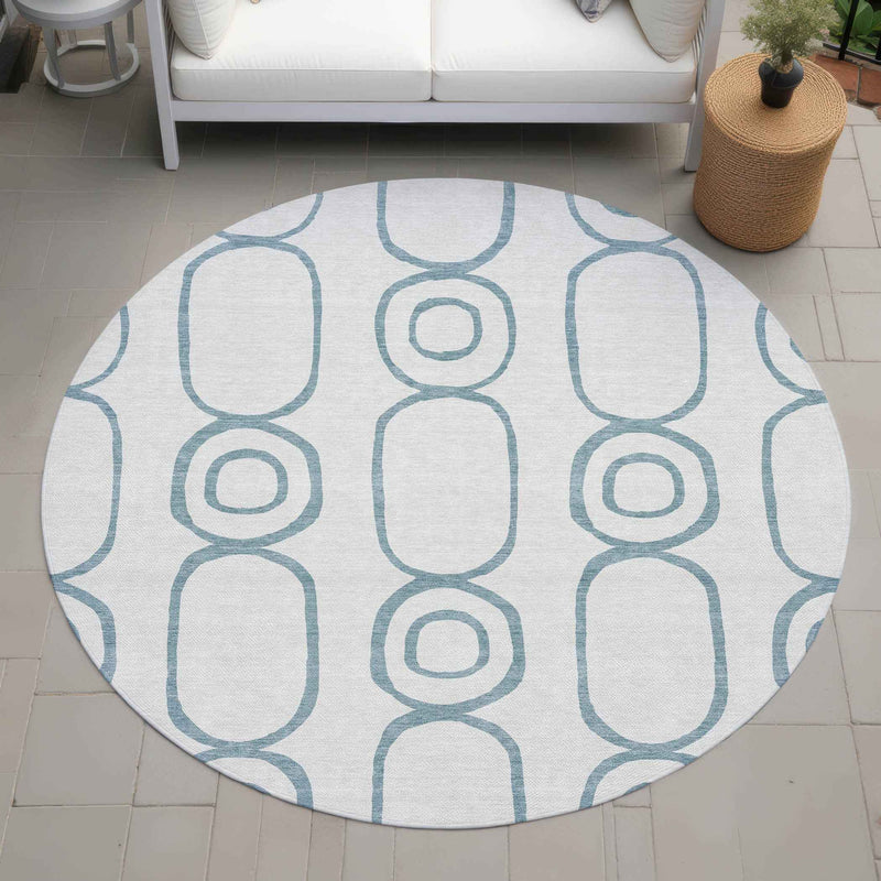 8' Teal Blue And Ivory Round Geometric Washable Indoor Outdoor Area Rug