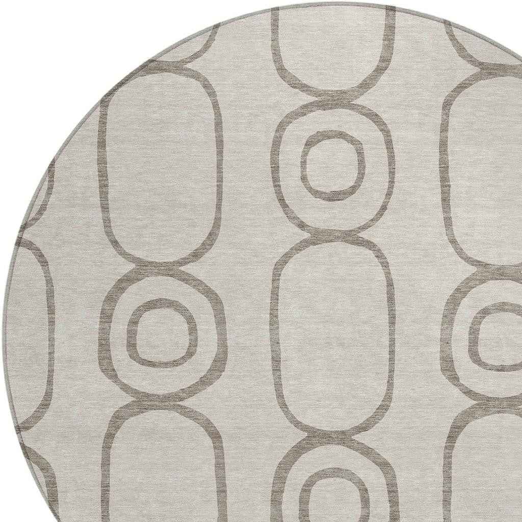 8' Taupe Beige And Ivory Round Geometric Washable Indoor Outdoor Area Rug