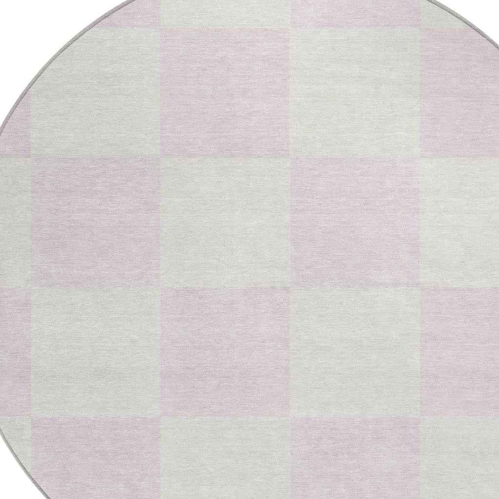 8' Pink And Ivory Round Geometric Washable Indoor Outdoor Area Rug