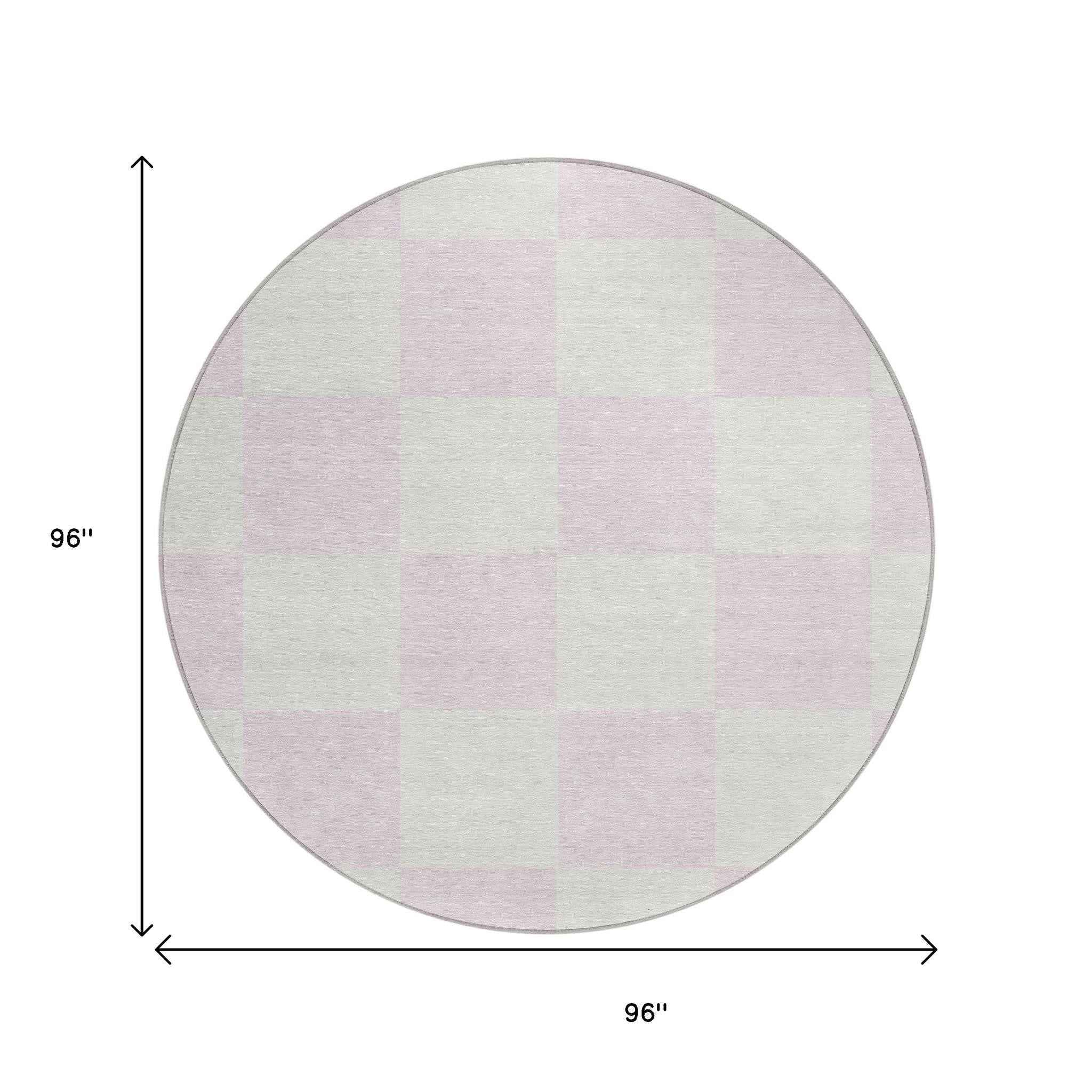 8' Pink And Ivory Round Geometric Washable Indoor Outdoor Area Rug
