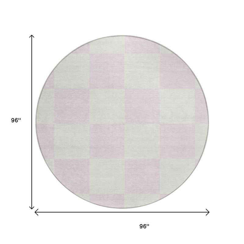 8' Pink And Ivory Round Geometric Washable Indoor Outdoor Area Rug