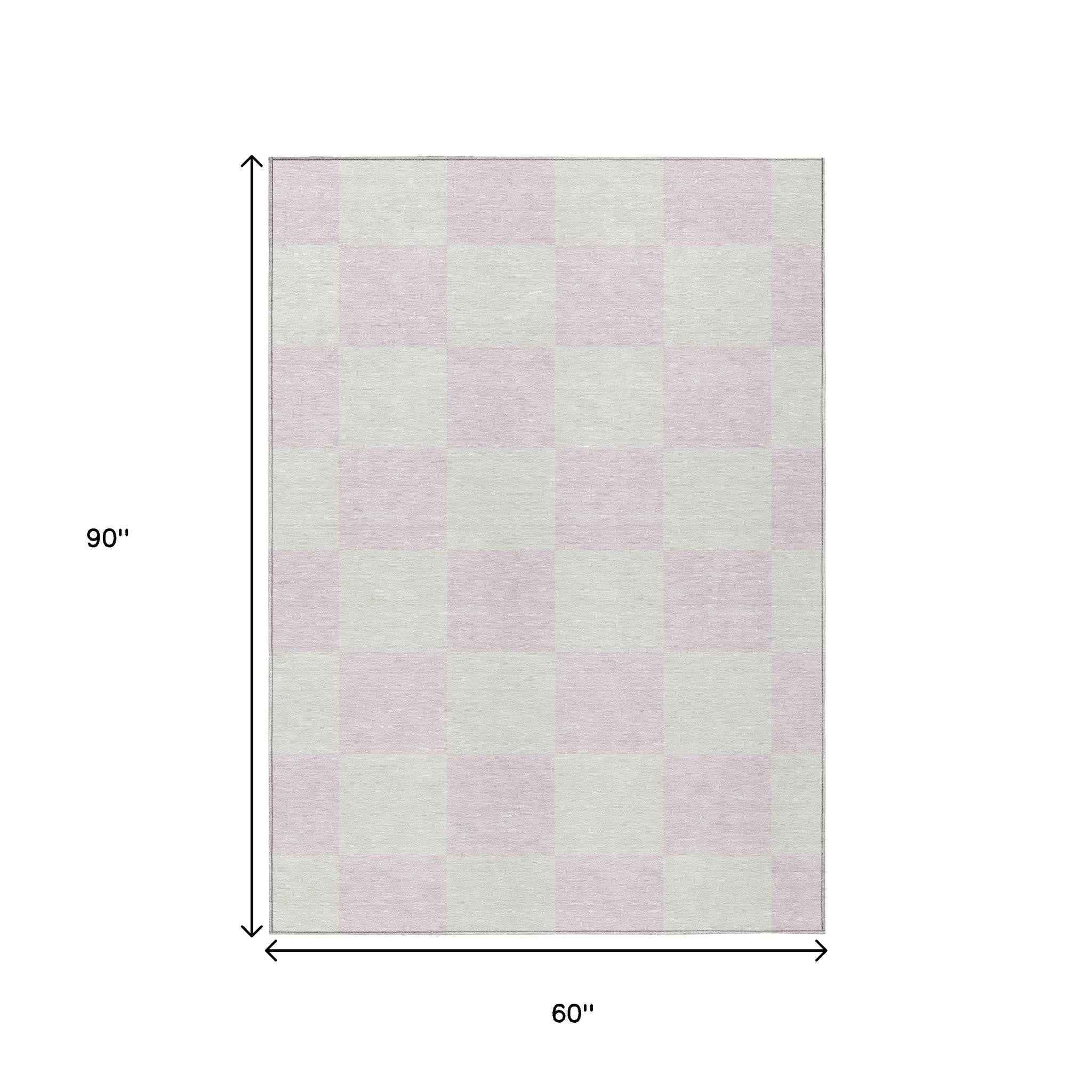 5' X 8' Pink And Ivory Geometric Washable Indoor Outdoor Area Rug