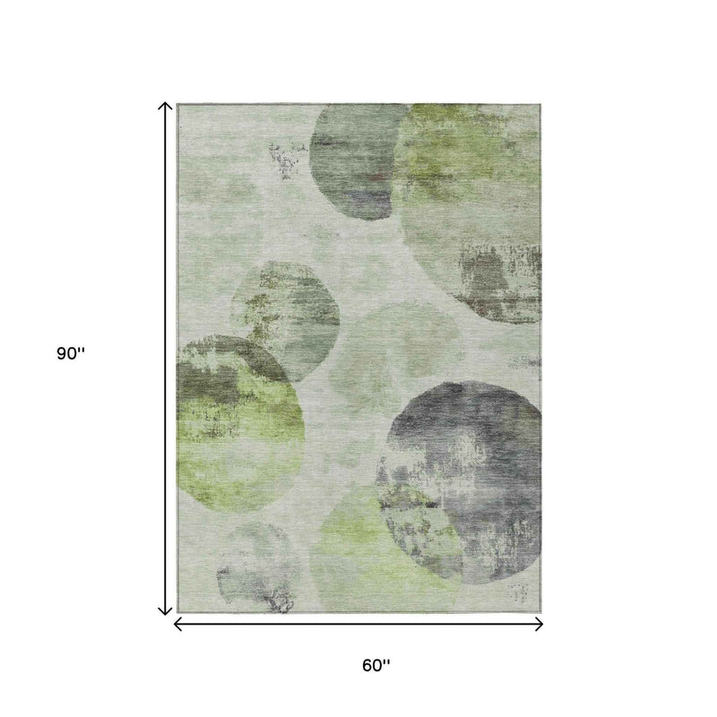 5' X 8' Artichoke Green And Ivory Abstract Washable Indoor Outdoor Area Rug