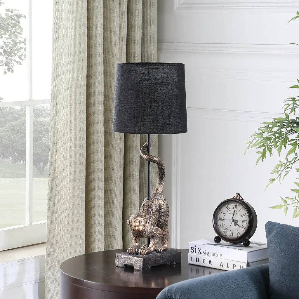 24" Antiqued Gold Monkey Table Lamp With Black Drum Shade - GreatEagleInc