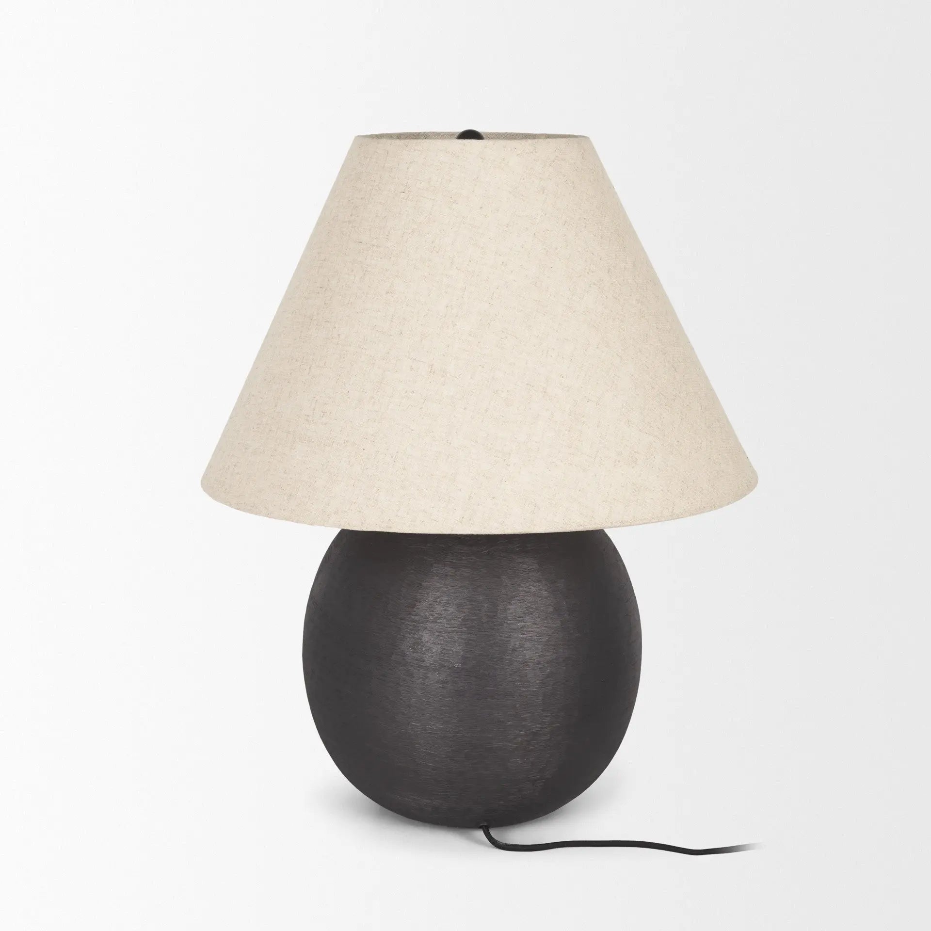 Black ceramic lamp with a textured oval base and a light beige linen shade. Ideal for modern home decor.
