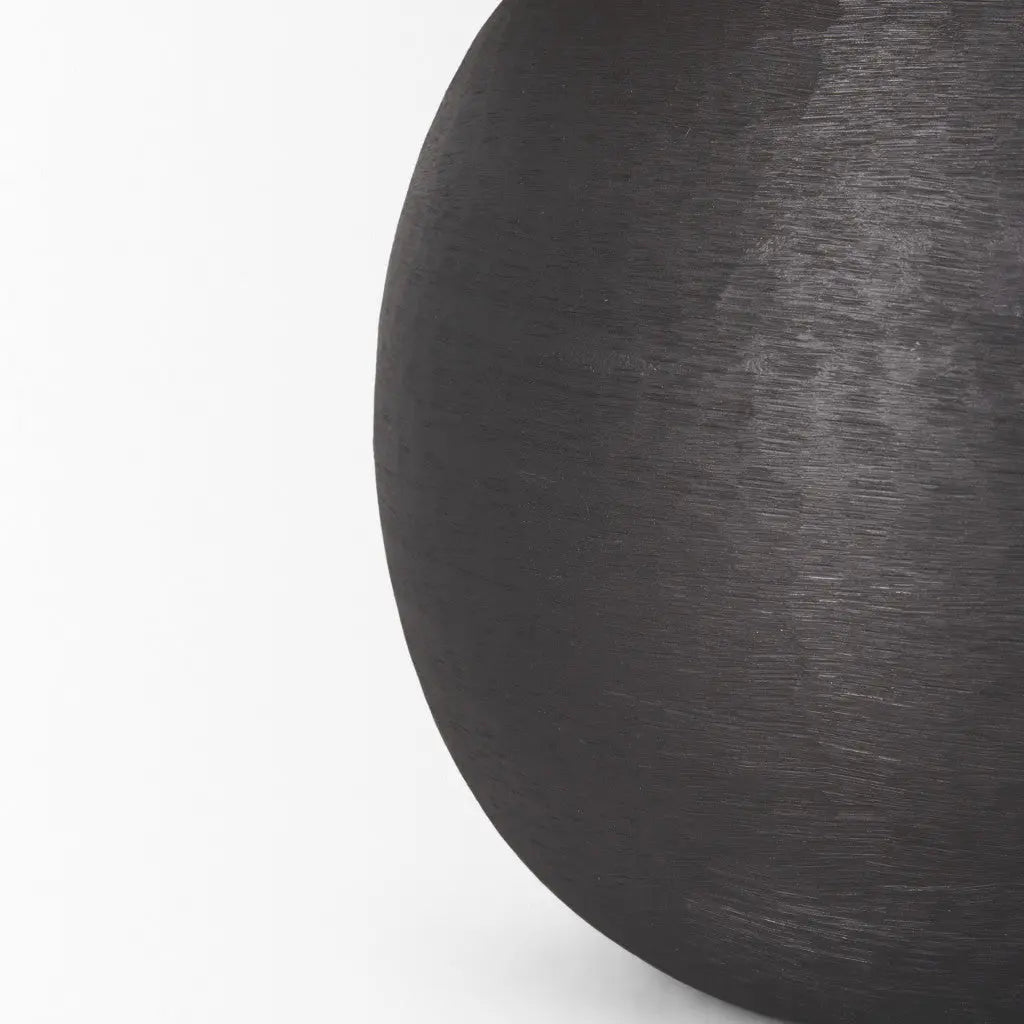 Matte black ceramic vase with a smooth, rounded shape, perfect for modern home décor.