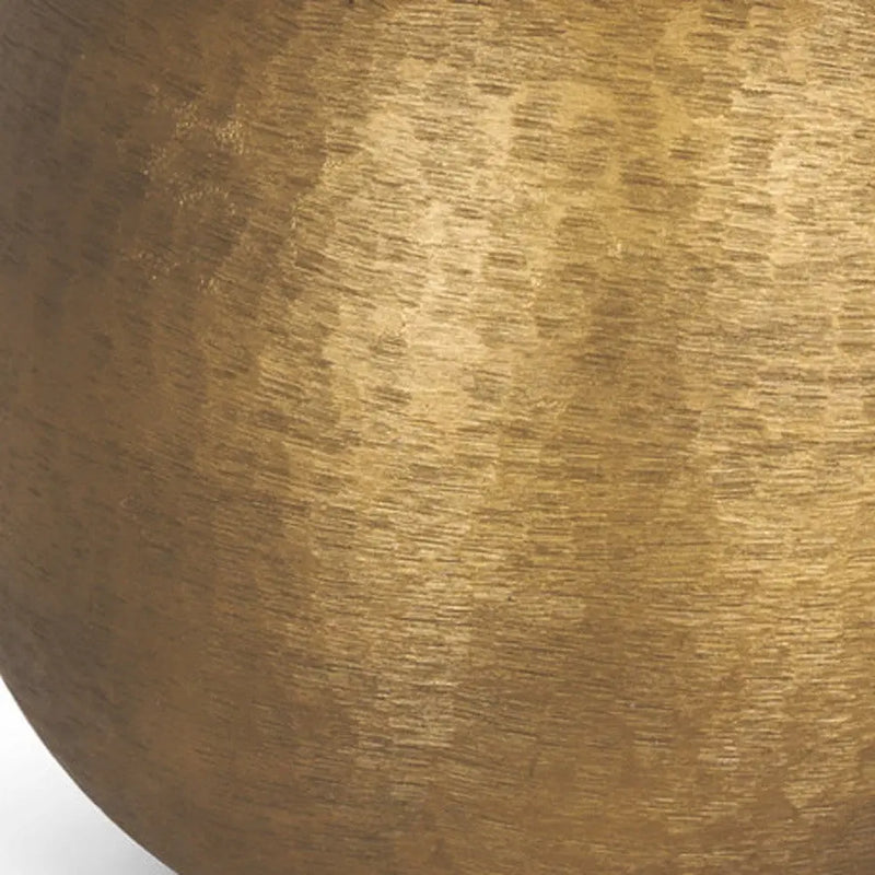 Brushed gold metal vase with a modern, textured finish, perfect for contemporary home decor.