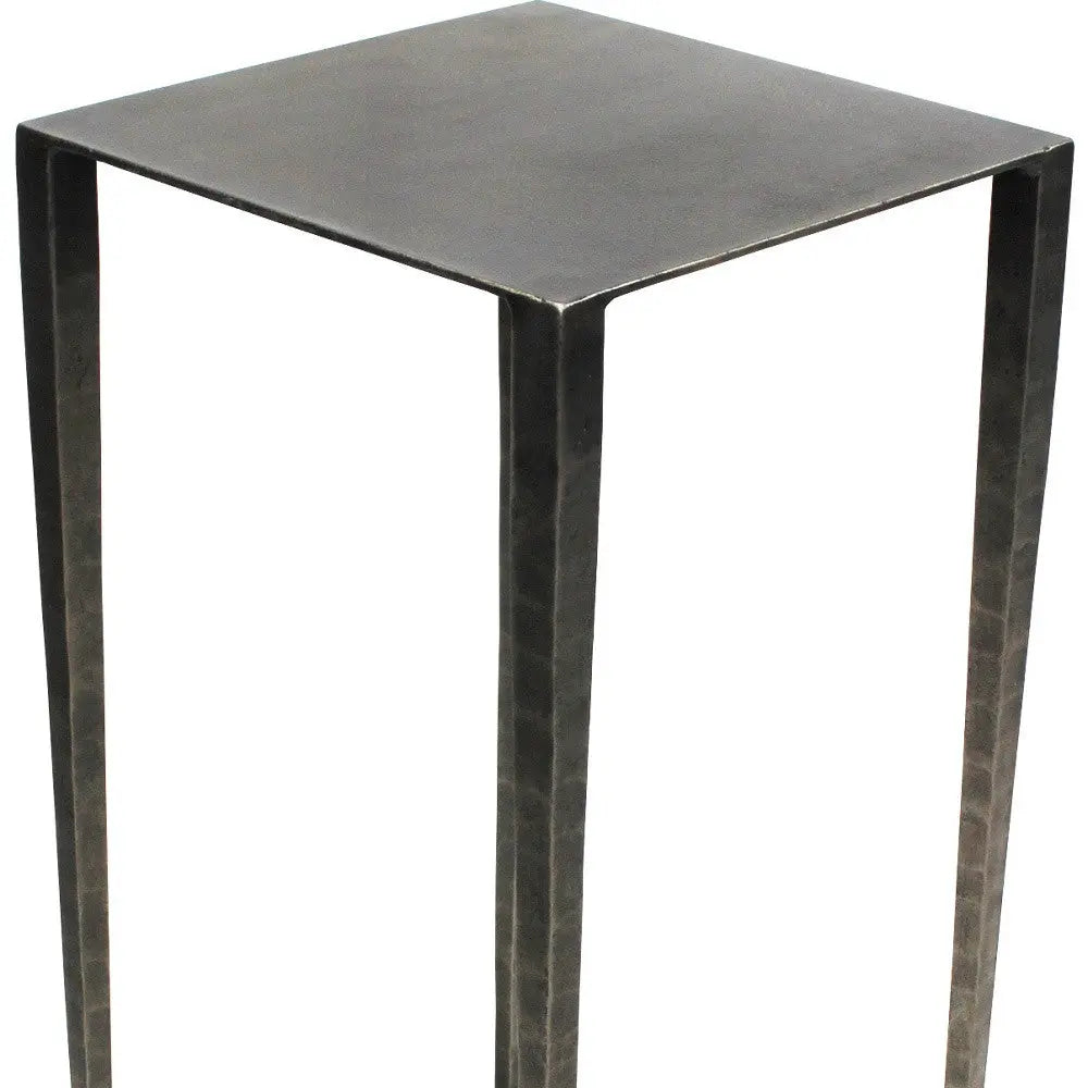 Black metal square side table with a modern design and sleek, minimalist lines. Ideal for contemporary decor.