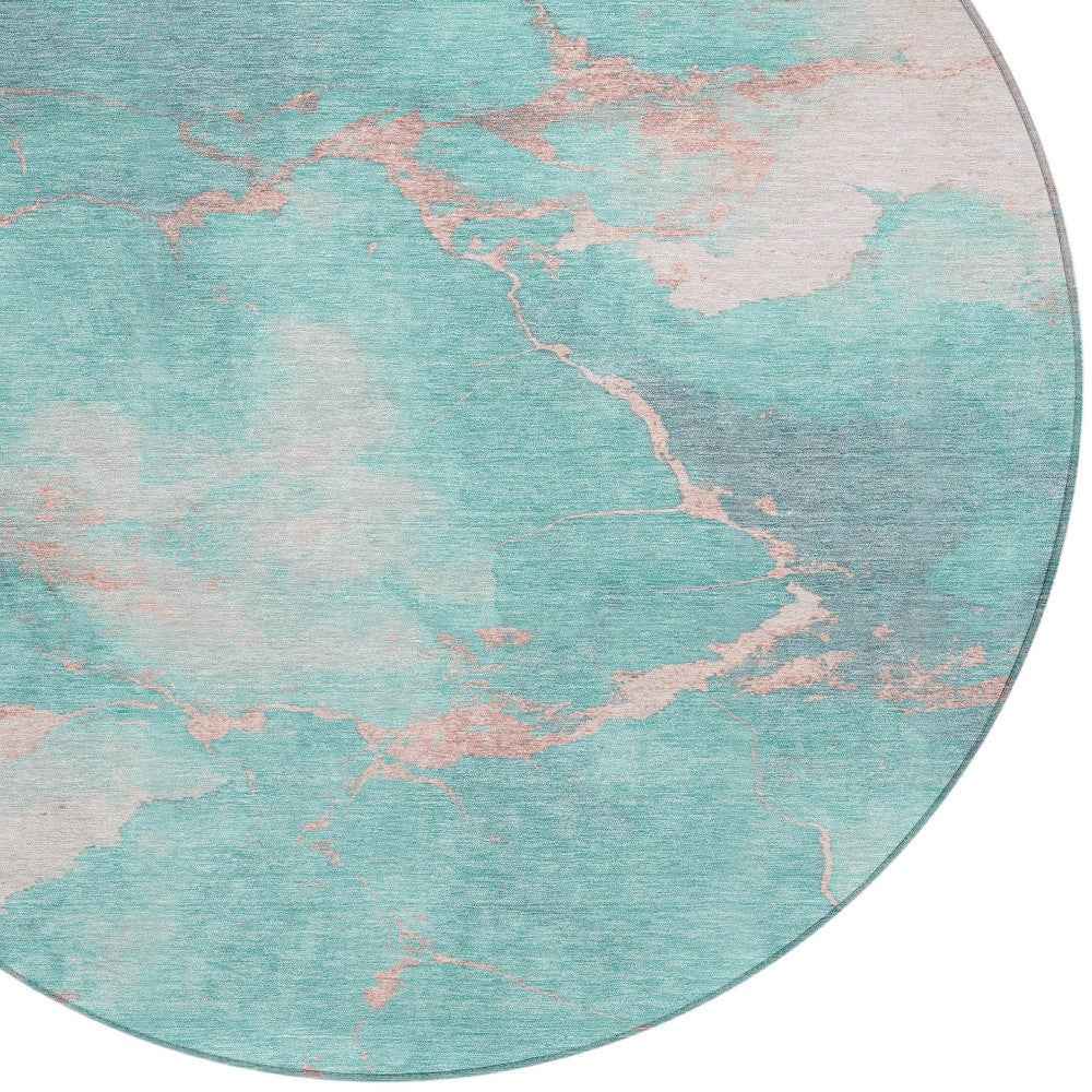 8' Teal Blue Peach And Ivory Round Abstract Washable Indoor Outdoor Area Rug