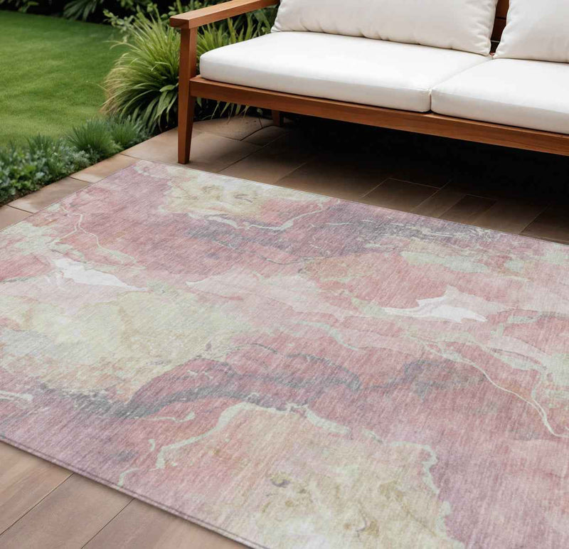 8' X 10' Pink And Beige Abstract Washable Indoor Outdoor Area Rug