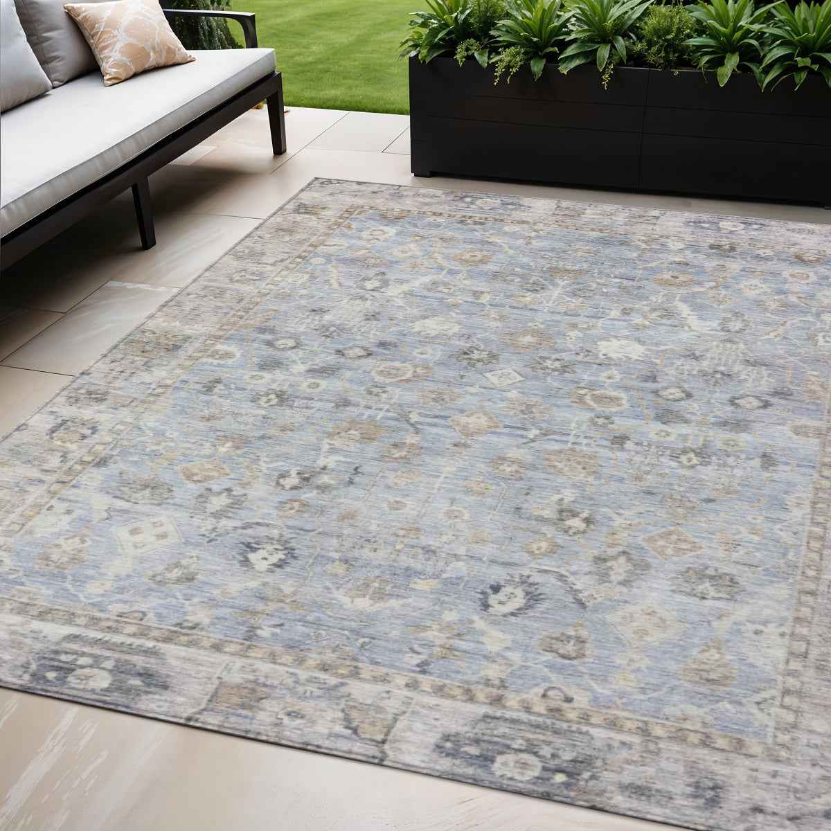5' X 8' Sky Blue Brown And Ivory Oriental Washable Indoor Outdoor Area Rug