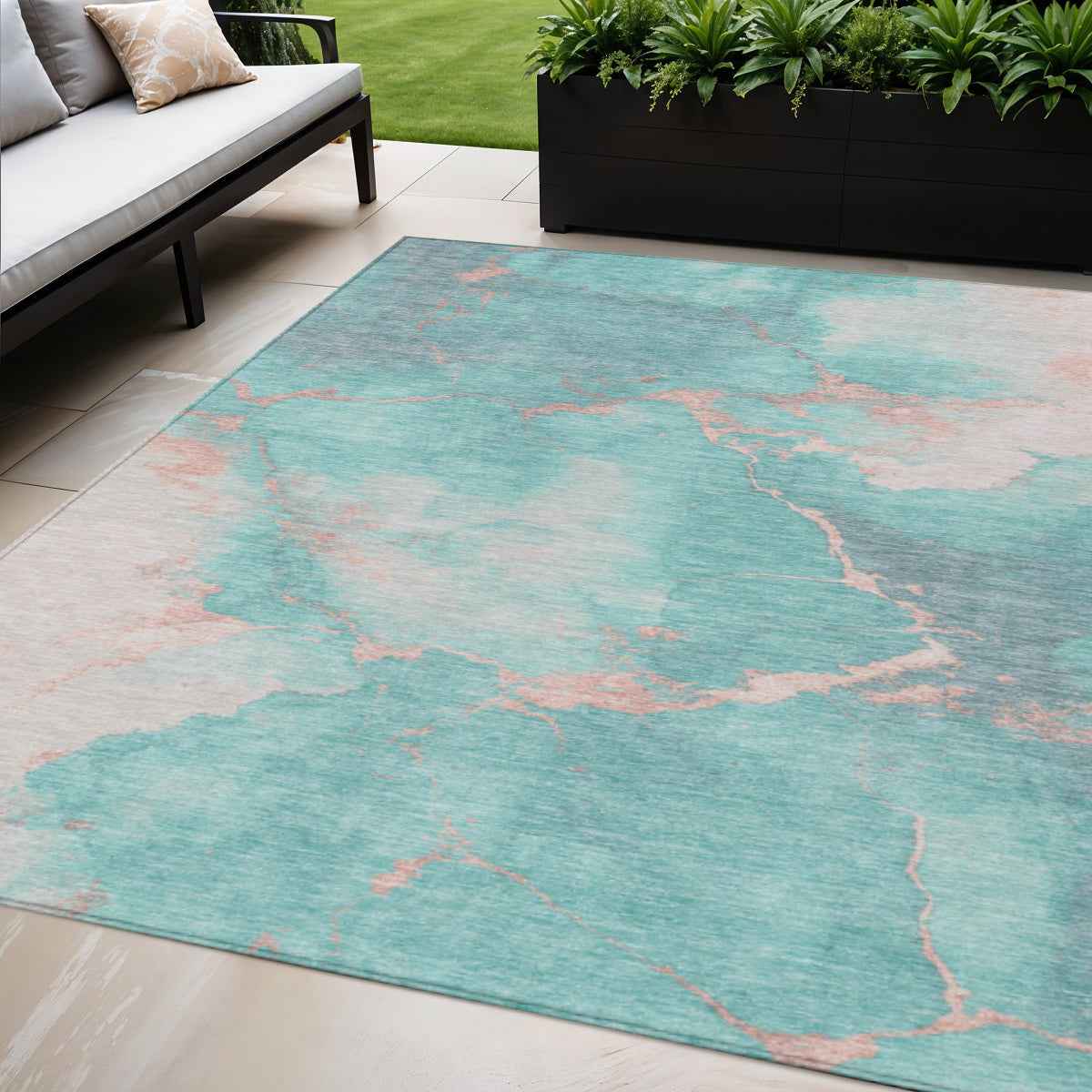 5' X 8' Teal Blue Peach And Ivory Abstract Washable Indoor Outdoor Area Rug