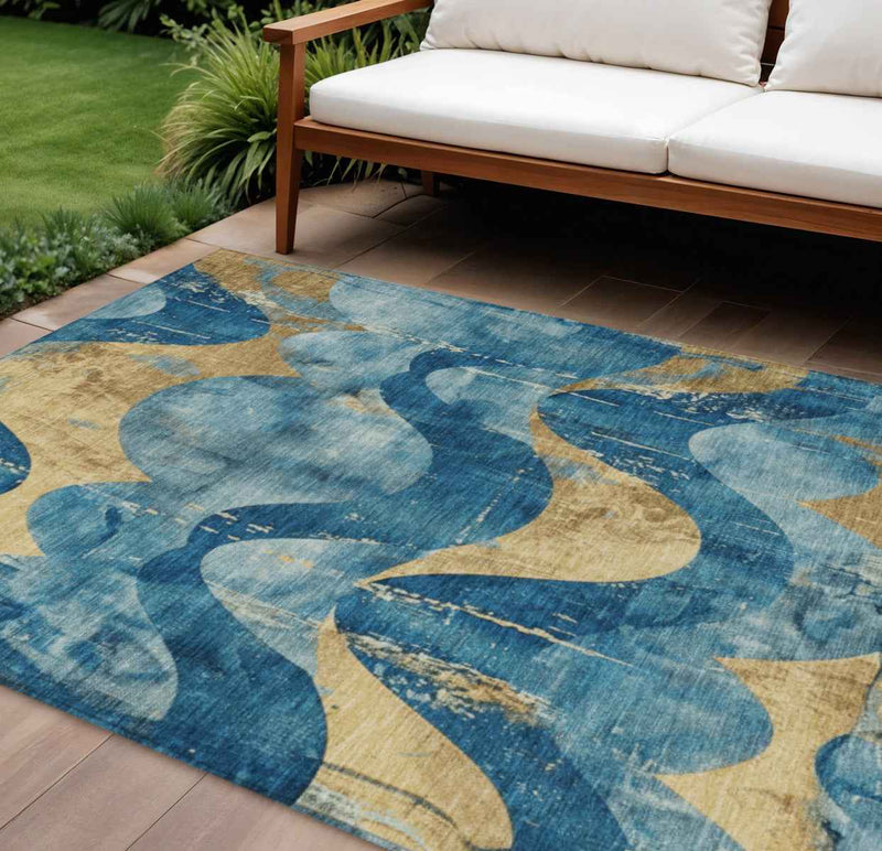 8' X 10' Teal Blue And Gold Abstract Washable Indoor Outdoor Area Rug