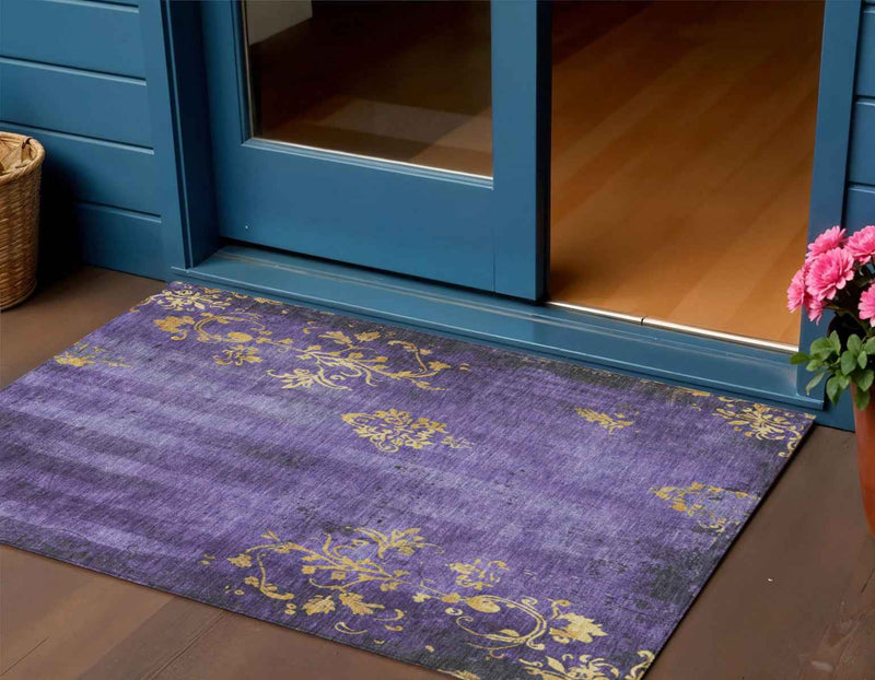 3' X 5' Purple And Gold Floral Washable Indoor Outdoor Area Rug