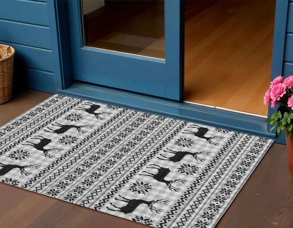 3' X 5' Silver Black And Ivory Animal Print Washable Indoor Outdoor Area Rug