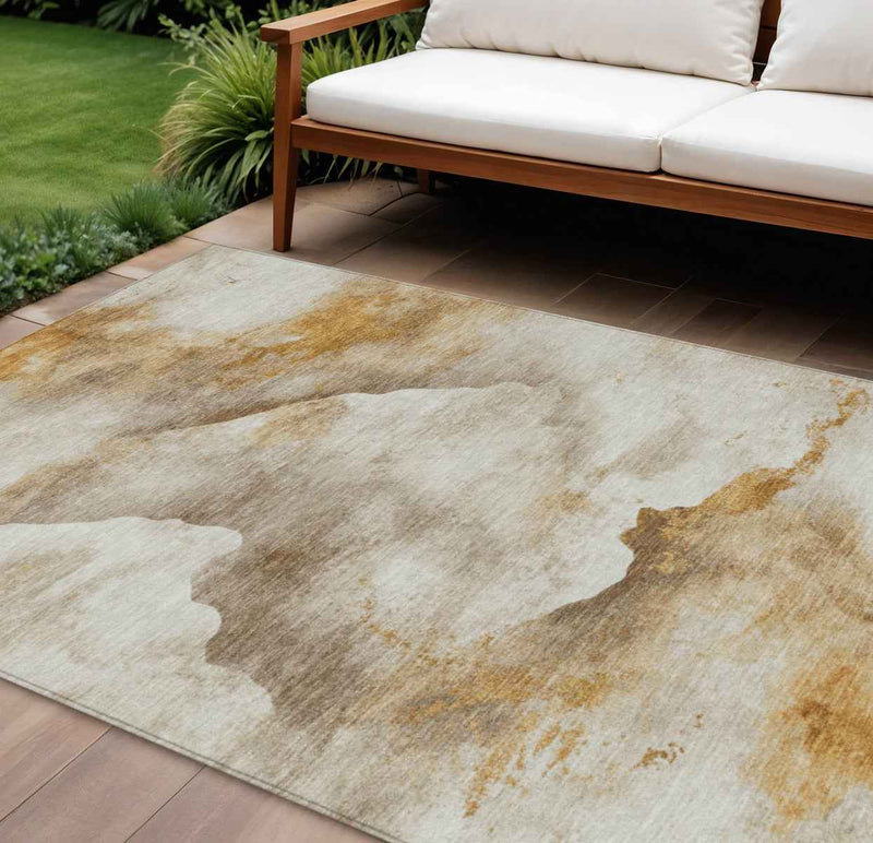 10' X 14' Beige And Gold Abstract Washable Indoor Outdoor Area Rug