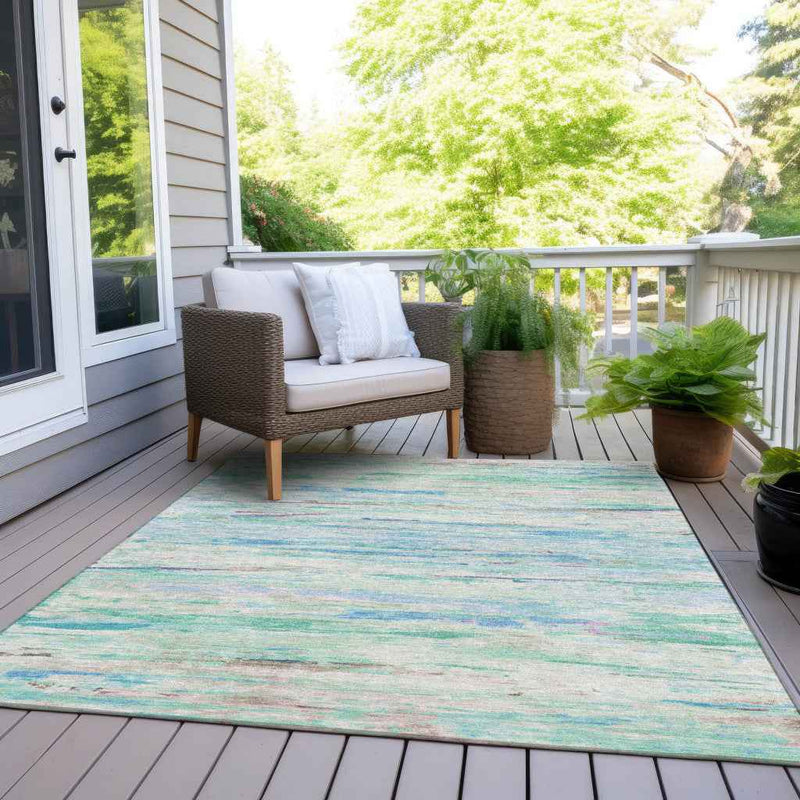 9' X 12' Teal Blue And Ivory Abstract Washable Indoor Outdoor Area Rug
