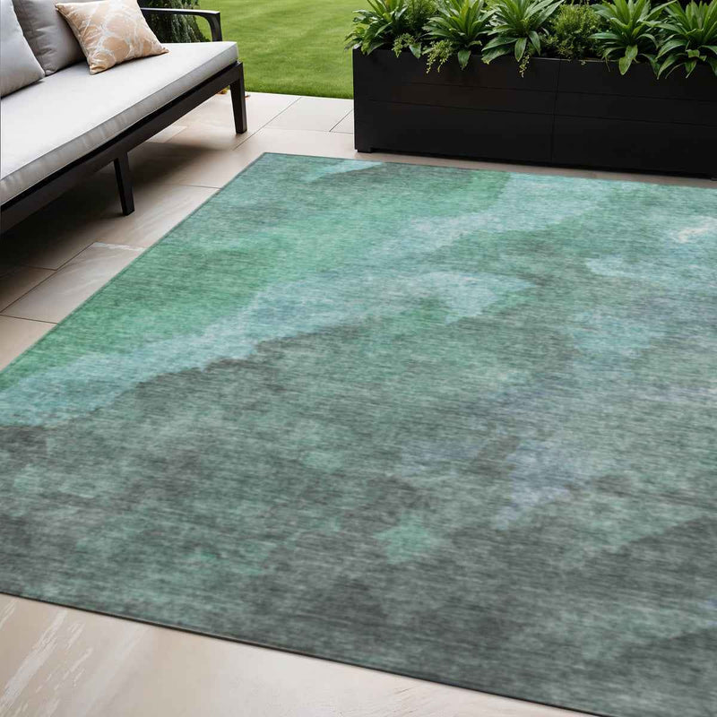 5' X 8' Teal Blue And Pale Aqua Abstract Washable Indoor Outdoor Area Rug