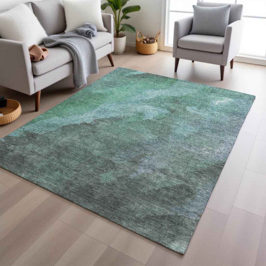 5' X 8' Teal Blue And Pale Aqua Abstract Washable Indoor Outdoor Area Rug