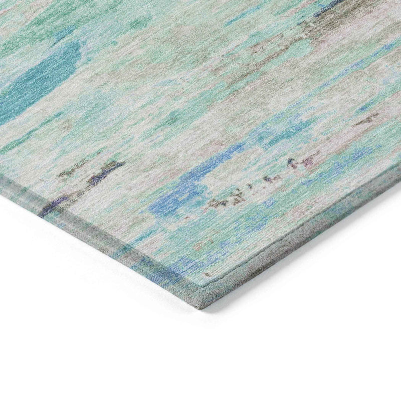 8' X 10' Teal Blue And Ivory Abstract Washable Indoor Outdoor Area Rug