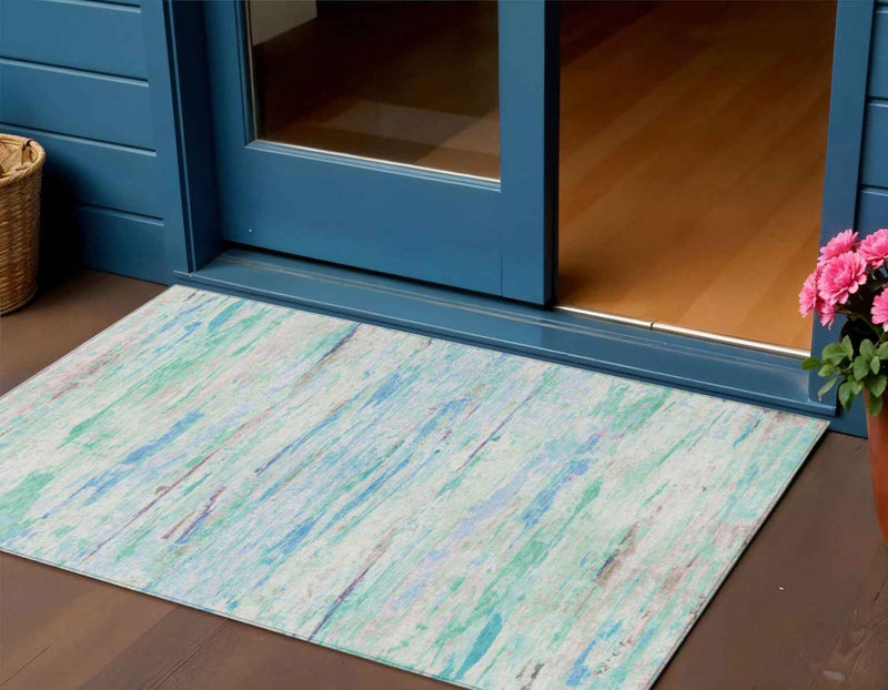3' X 5' Teal Blue And Ivory Abstract Washable Indoor Outdoor Area Rug