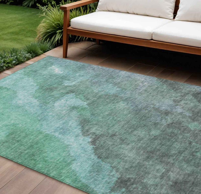 8' X 10' Teal Blue And Pale Aqua Abstract Washable Indoor Outdoor Area Rug