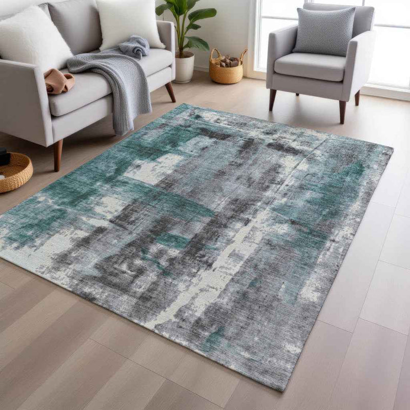 5' X 8' Teal Blue And Ivory Abstract Washable Indoor Outdoor Area Rug