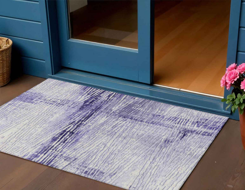 3' X 5' Lavender And Ivory Striped Washable Indoor Outdoor Area Rug