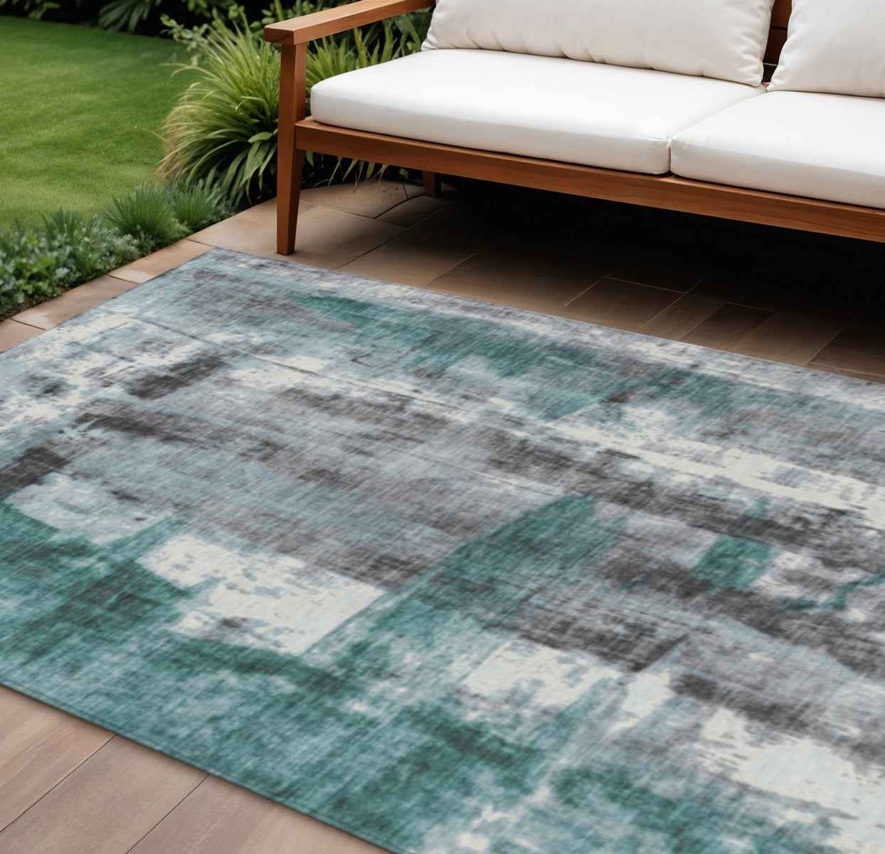 8' X 10' Teal Blue And Ivory Abstract Washable Indoor Outdoor Area Rug