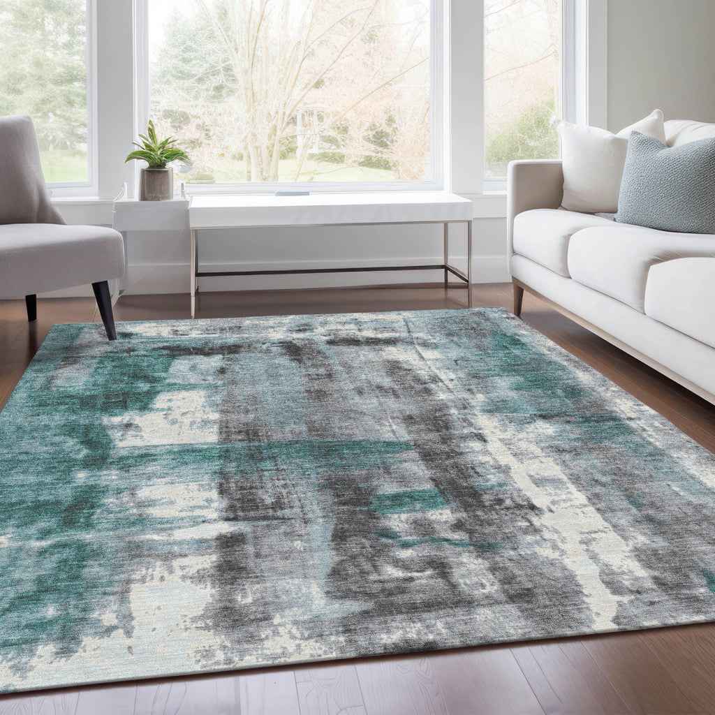 8' X 10' Teal Blue And Ivory Abstract Washable Indoor Outdoor Area Rug