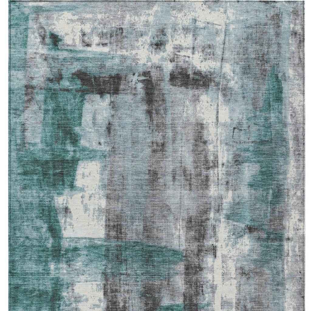 8' X 10' Teal Blue And Ivory Abstract Washable Indoor Outdoor Area Rug