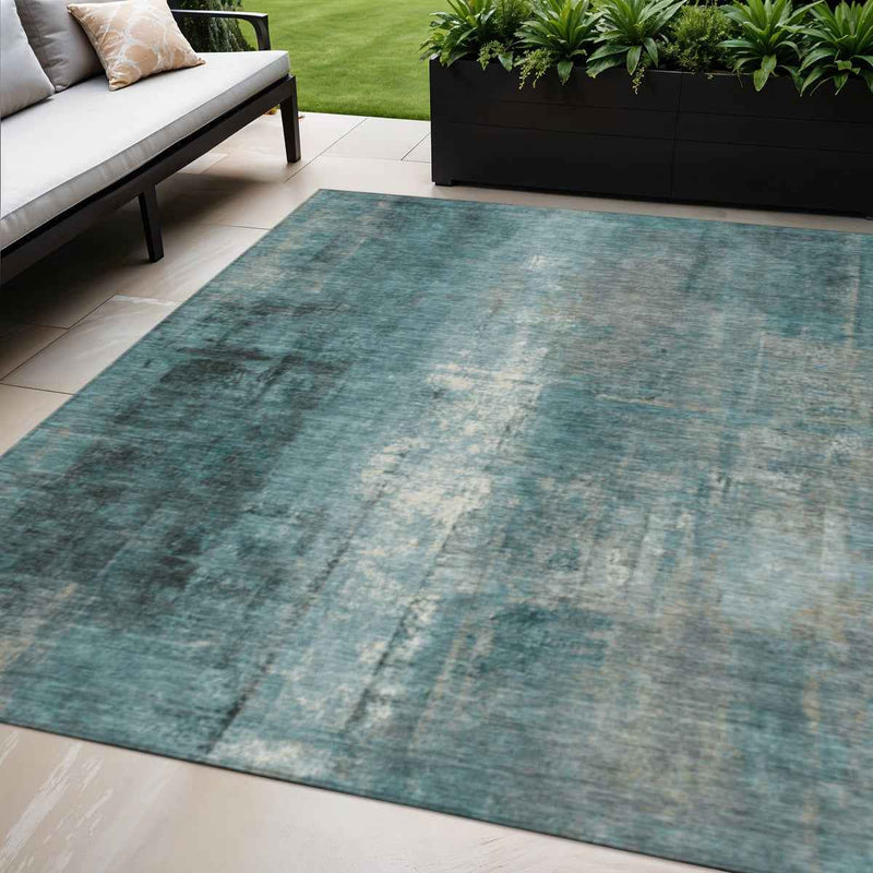 5' X 8' Teal Blue And Ivory Abstract Washable Indoor Outdoor Area Rug