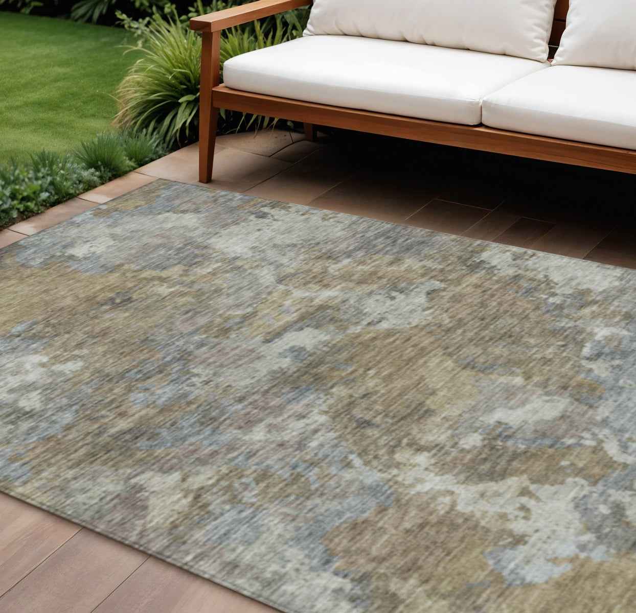 8' X 10' Gold And Ivory Abstract Washable Indoor Outdoor Area Rug
