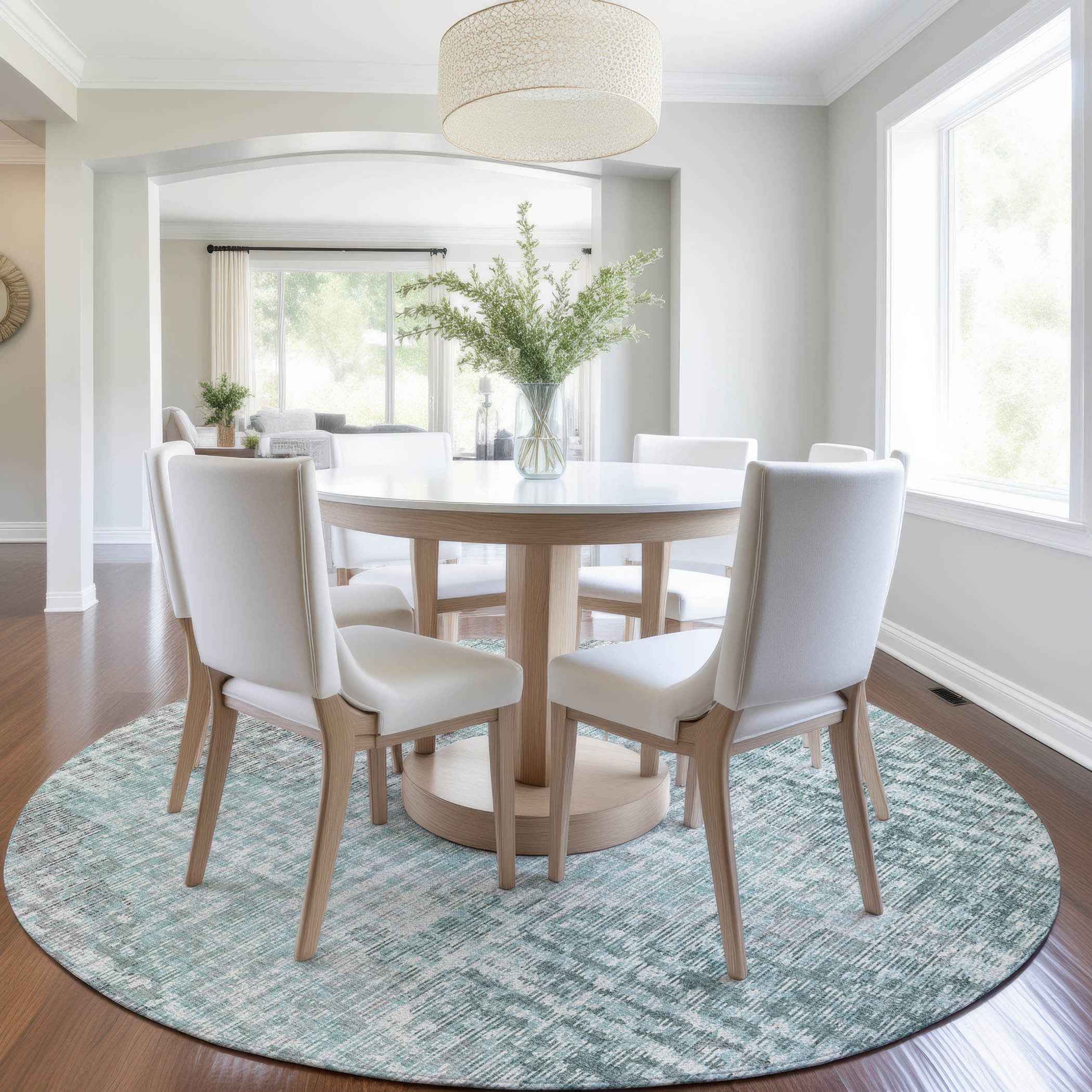 8' Teal Blue And Ivory Round Geometric Washable Indoor Outdoor Area Rug