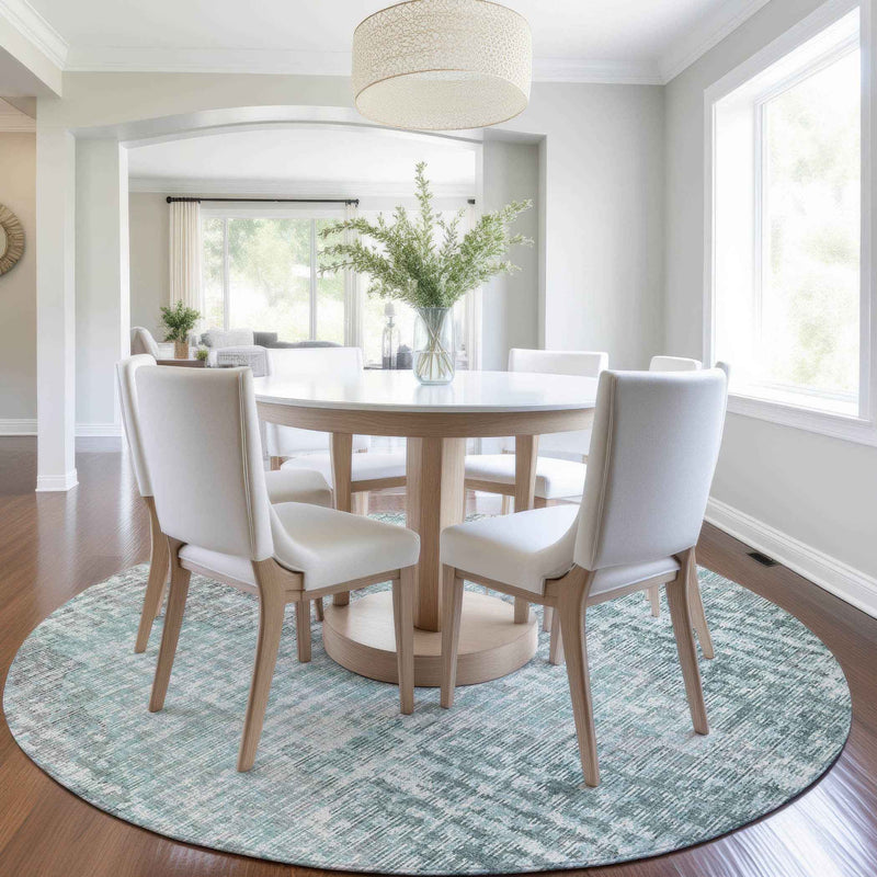 8' Teal Blue And Ivory Round Geometric Washable Indoor Outdoor Area Rug